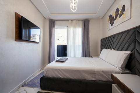Communal lounge/ TV room, Bed, TV and multimedia, Photo of the whole room, Bedroom