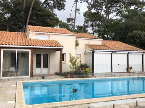Property building, Living room, Swimming pool