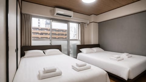 Bed, Photo of the whole room, Bedroom, towels, air conditioner
