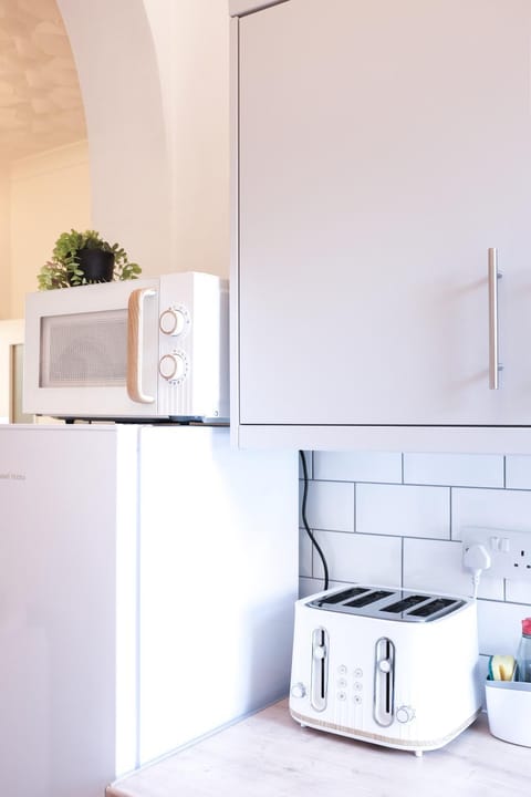 Kitchen or kitchenette, toaster