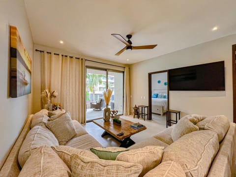 TV and multimedia, Living room, Seating area, Pool view, Pool view, Swimming pool, group of guests, Family, air conditioner