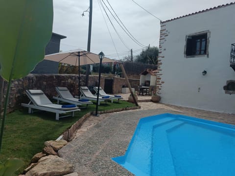 Swimming pool, sunbed