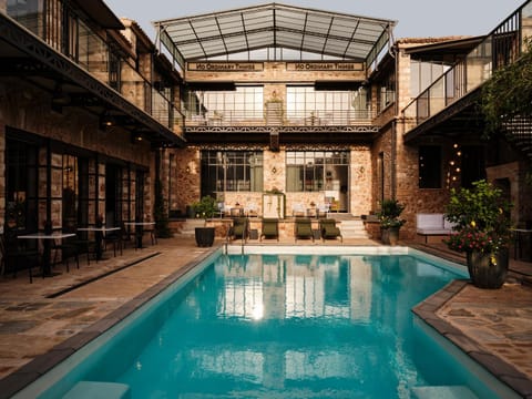 Property building, Patio, Day, Pool view, Swimming pool, sunbed