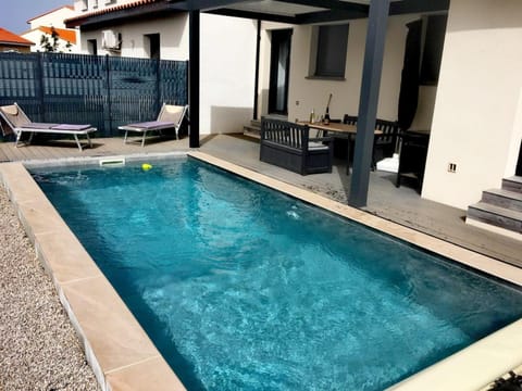 Property building, Living room, Swimming pool