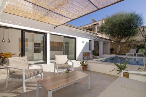 Property building, Patio, Off site, Day, Natural landscape, View (from property/room), Balcony/Terrace, Living room, Seating area, Dining area, Pool view, Swimming pool, sunbed