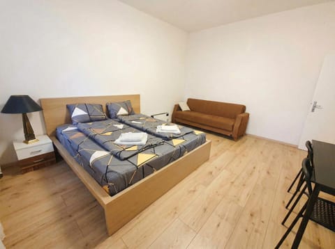 Property building, Bed, Seating area, Bedroom