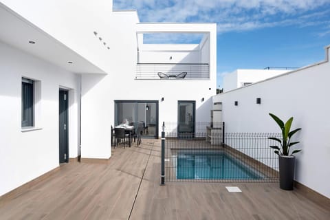 Property building, Living room, Swimming pool