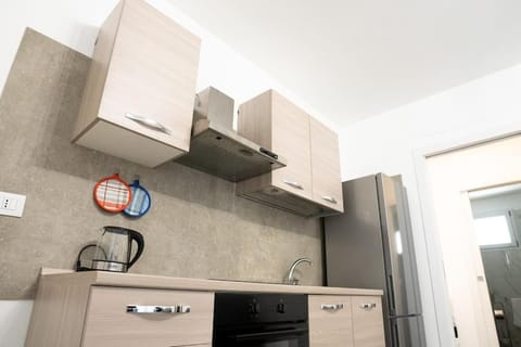 Kitchen or kitchenette, oven, stove