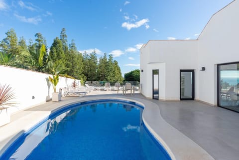 Property building, Living room, Swimming pool