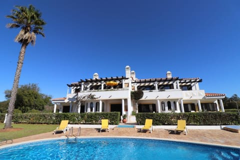 Property building, Living room, Swimming pool