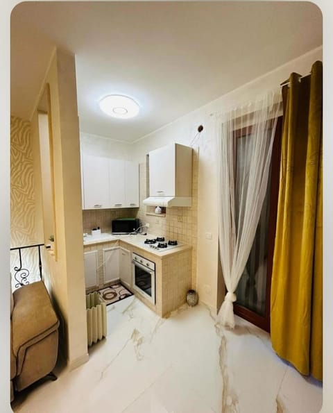 Kitchen or kitchenette, stove