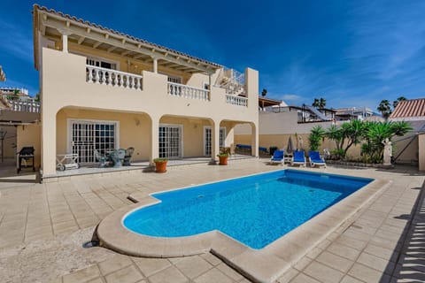 Property building, Living room, Swimming pool
