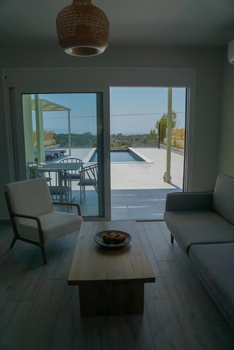 Patio, Natural landscape, View (from property/room), Living room, Seating area, Dining area, Pool view, Sea view, Swimming pool, sunbed
