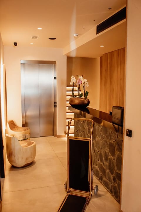 Property building, Lobby or reception, Text overlay