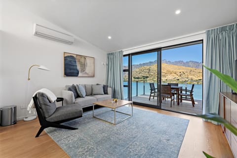 Natural landscape, TV and multimedia, Living room, Seating area, Lake view, Lake view, Mountain view