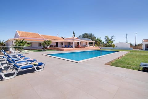 Property building, Living room, Swimming pool