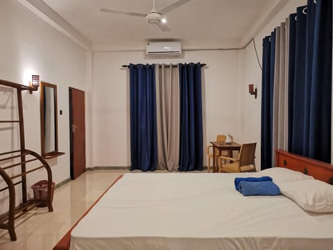 Bed, Photo of the whole room, Bedroom, towels, air conditioner