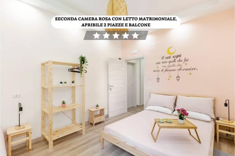 Bed, Photo of the whole room, Bedroom, Text overlay, towels, wardrobe