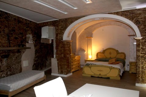 Bed, Living room, Seating area, Bedroom