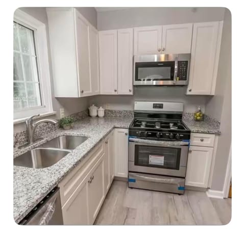 Kitchen or kitchenette, dishwasher, oven, toaster