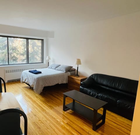 Bed, Living room, Seating area, Bedroom