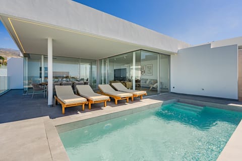 Patio, Natural landscape, Pool view, Swimming pool, sunbed