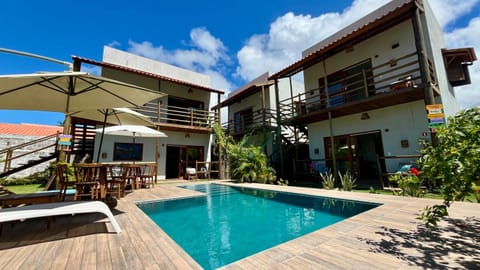 Property building, Patio, Day, Garden, Pool view, Swimming pool, sunbed