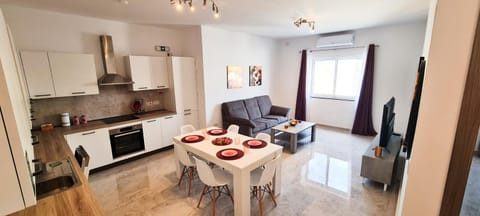 TV and multimedia, Kitchen or kitchenette, Living room, Seating area, Dining area, dishwasher