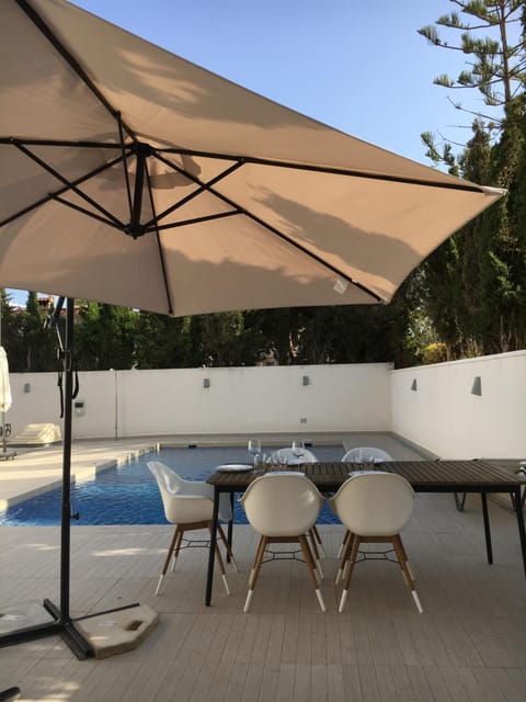 Balcony/Terrace, Dining area, Pool view, Swimming pool