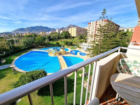 View (from property/room), Balcony/Terrace, Mountain view, Pool view, Swimming pool, Swimming pool