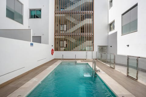 Property building, Living room, Swimming pool