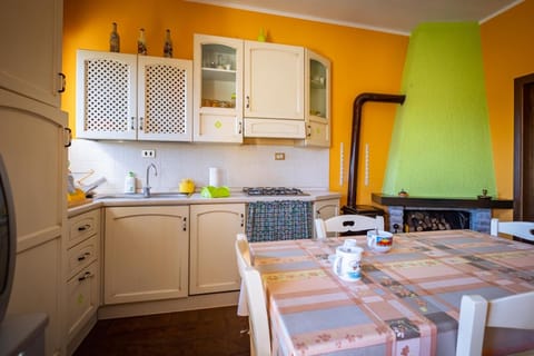 Dining area, stove, kitchen