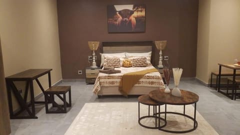 Bed, Seating area, Bedroom
