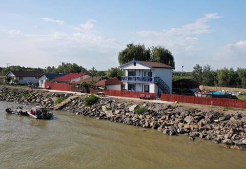 Property building, Day, Natural landscape, Activities, Activities, River view