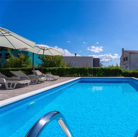 Patio, Pool view, Swimming pool, sunbed