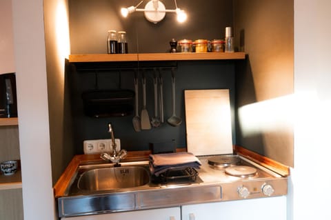 Kitchen or kitchenette, stove