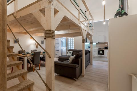 Kitchen or kitchenette, Living room, Seating area, Dining area