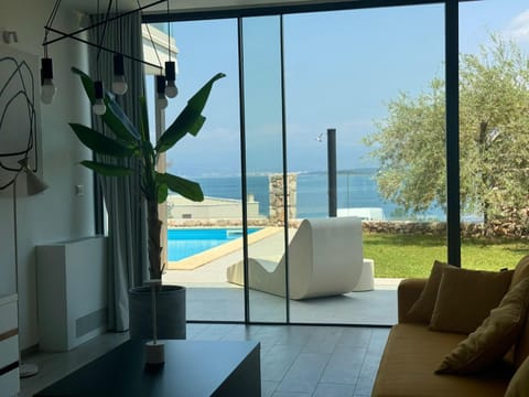 Balcony/Terrace, Living room, Seating area, Garden view, Sea view, Swimming pool, sunbed