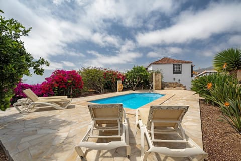 Property building, Living room, Swimming pool