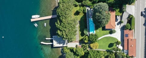 Property building, Nearby landmark, Day, Natural landscape, Lake view, Pool view, Swimming pool