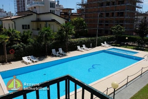 Property building, Living room, Swimming pool