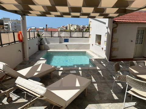 Patio, Day, View (from property/room), Seating area, Pool view, Swimming pool, sunbed