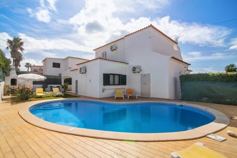 Property building, Living room, Swimming pool