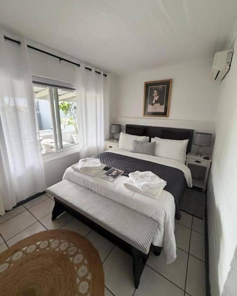 Bedroom, towels, wardrobe, air conditioner