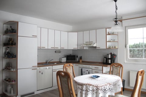 Kitchen or kitchenette, Dining area, dishwasher, microwave, stove, toaster