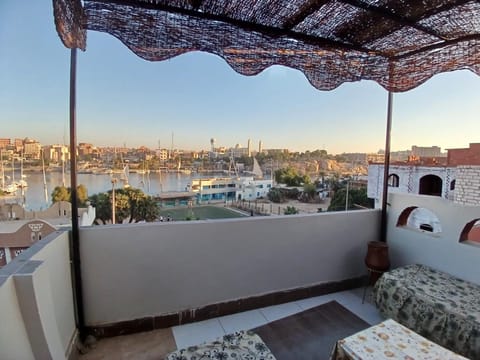 Patio, Day, Natural landscape, View (from property/room), Balcony/Terrace, Living room, Seating area, City view, River view