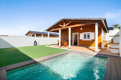 Property building, Living room, Swimming pool