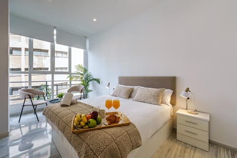 Bed, Photo of the whole room, Bedroom, towels, air conditioner
