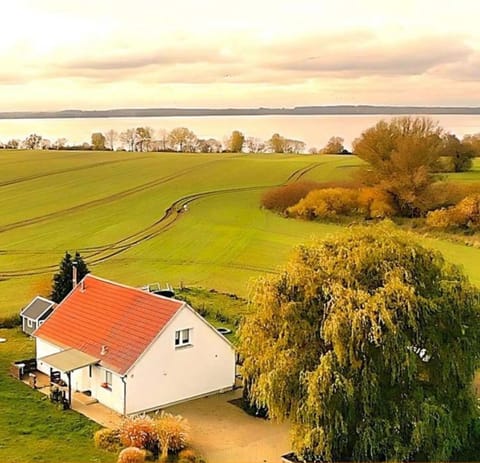 Property building, Nearby landmark, Spring, Natural landscape, Lake view