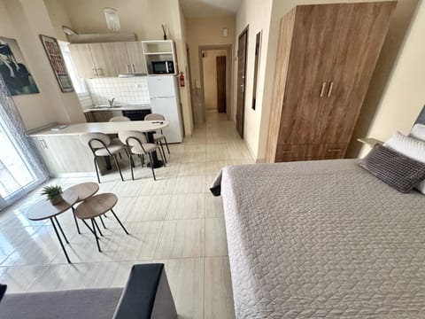 Bed, Kitchen or kitchenette, Living room, Dining area, stove, wardrobe